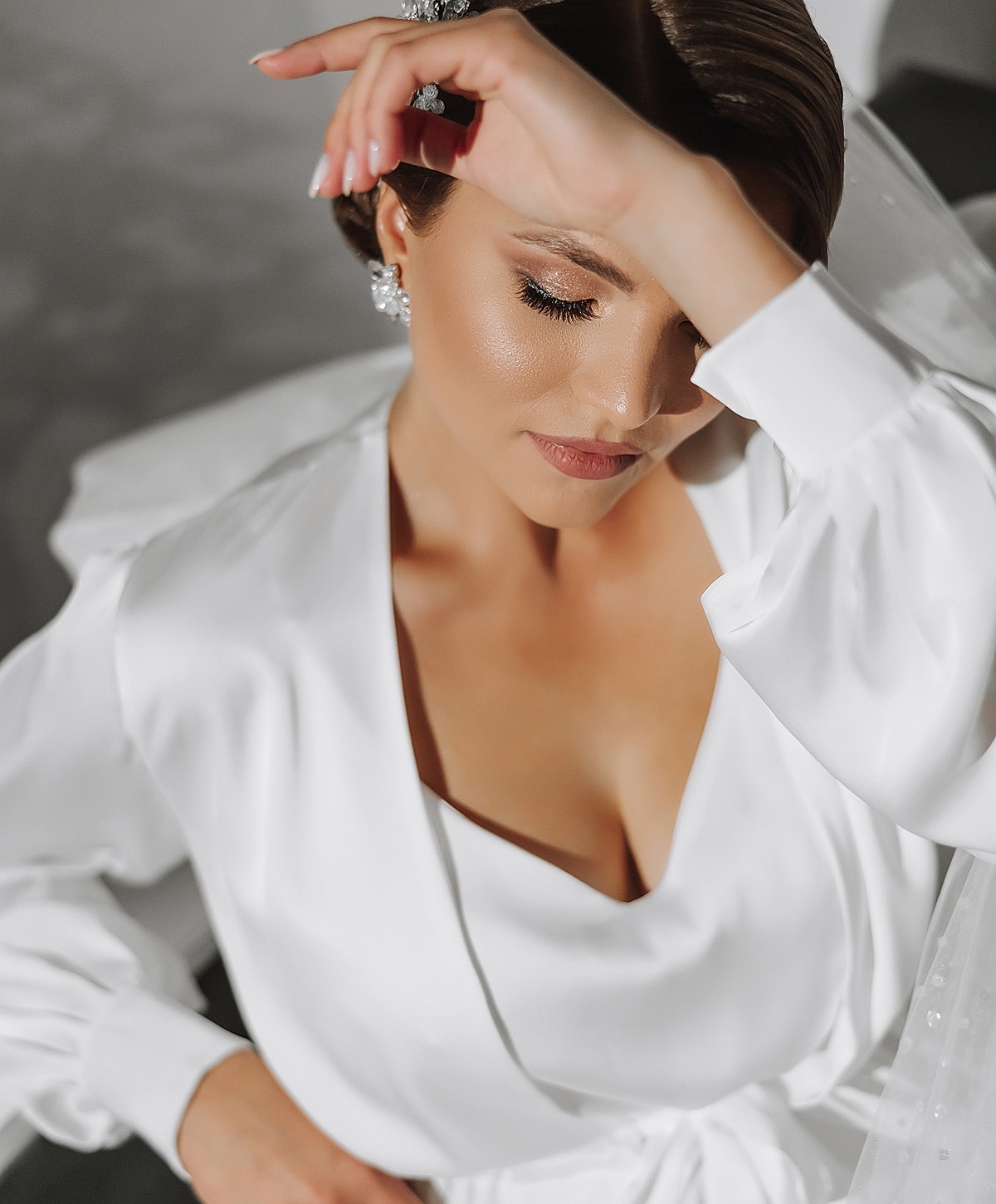 Bridal portrait with elegant hairstyle and makeup.